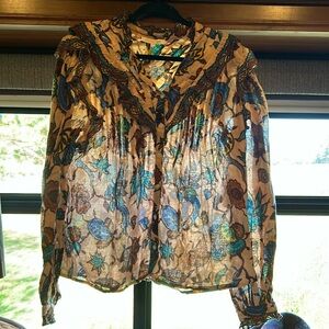 NWT women’s long sleeve button up ruffled blouse by Love the Label size large